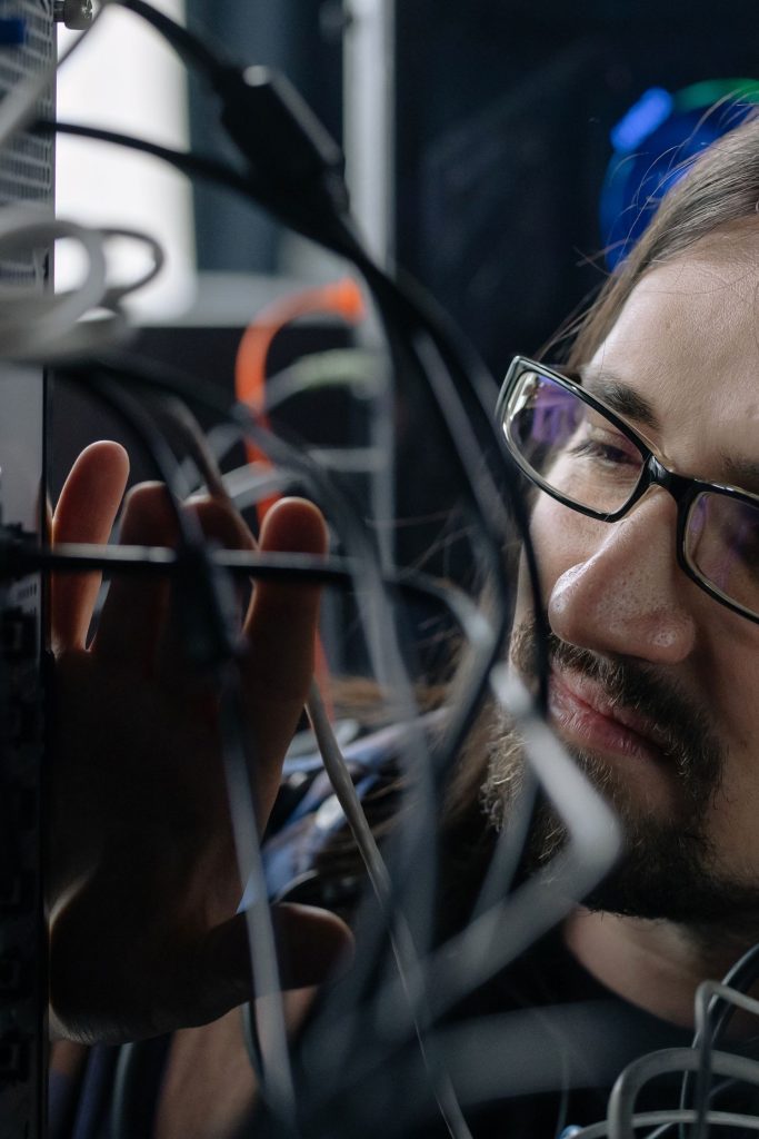 IT technician working in a server room