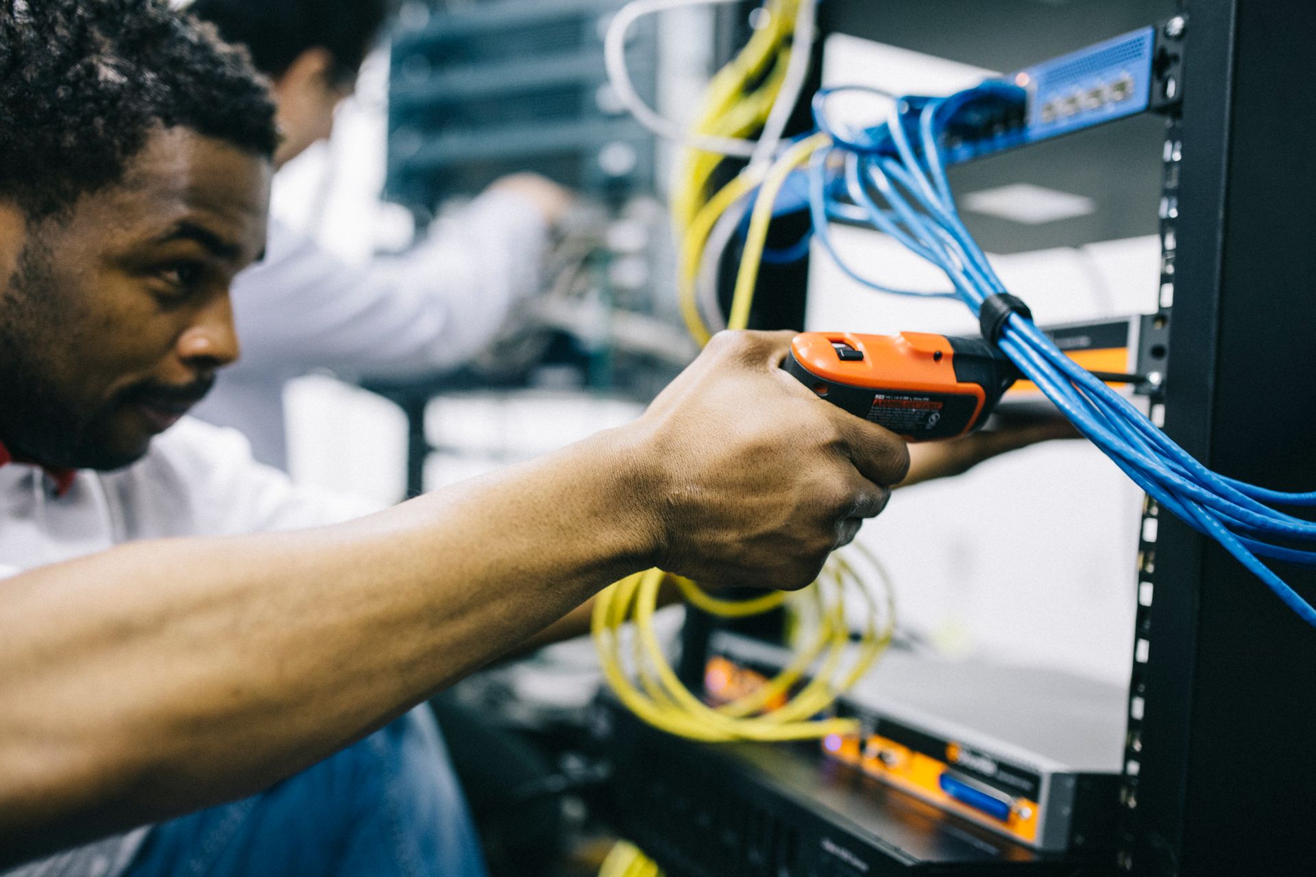 Technician repairing computer hardware